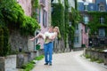 Groom carrying young beautiful bride in his arms Royalty Free Stock Photo