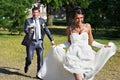 Groom catches bride at a wedding walk
