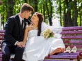 Groom embrace bride outdoor Royalty Free Stock Photo