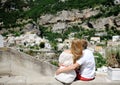 Groom embraces bride in wedding day in Positano, Italy Royalty Free Stock Photo