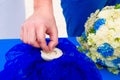 Groom giving an engagement ring to his bride. Wedding ceremony o