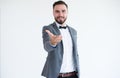 Groom handsome men with bearded in formal tuxedo and suit showing hand greeting and welcome on white background,Blurred face