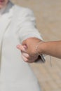 Groom holding hands Bride Royalty Free Stock Photo