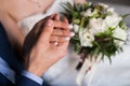 The Groom Holding His Bride`s Hand. Royalty Free Stock Photo