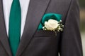 Groom jacket with green tie Royalty Free Stock Photo