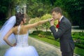 Groom kisses his bride`s hand