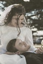 Groom Laying In His Bride`s Lap Royalty Free Stock Photo