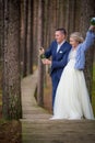 Groom openning the champagne at wedding day Royalty Free Stock Photo