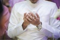 GROOM PUT HIS HAND TO PRAY DOA. Royalty Free Stock Photo