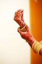 Groom puts bangle in bride hand at bangle ceremony