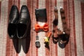 Groom set clothes. Wedding rings, shoes, cufflinks and bow tie Royalty Free Stock Photo