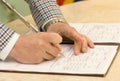 Groom Signing Marriage Certificate