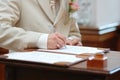 Groom signing marriage license