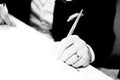 Groom signing wedding contract Royalty Free Stock Photo