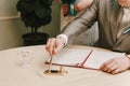 Groom signs documents in registry office Royalty Free Stock Photo