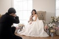 Groom taking pictures of beautiful bride for wedding ceremony, Love ,Romantic and wedding proposal concept Royalty Free Stock Photo