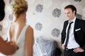 Groom watching his bride getting ready Royalty Free Stock Photo