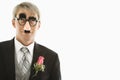 Groom wearing groucho glasses.