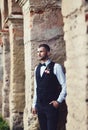 Groom at wedding tuxedo smiling and waiting for bride Royalty Free Stock Photo