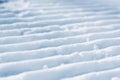 Groomed empty ski track, corduroy snow texture