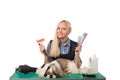 Groomer with combs and cute shih-tzu dog Royalty Free Stock Photo