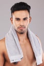 Grooming, clean with towel and hygiene, man in beauty portrait, skin and face care with studio background. Shaving