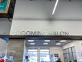 A Grooming Salon sign at a Petsmart Pet Store in Orlando, Florida
