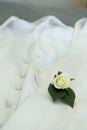 Grooms boutonniere & wedding rings