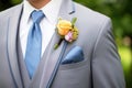 grooms suit with boutonniere attached