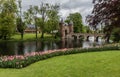 Groot-Bijgaarden, Belgium : Panoramic view over the blooming flowers, pond and castle during the yearly exposition Royalty Free Stock Photo