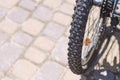 Grooved tire on a mountain bike wheel on a sunny day Royalty Free Stock Photo