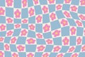 Groovy checkered pattern with daisy flowers. Trippy retro background in 60s-70s hippie aesthetic Royalty Free Stock Photo
