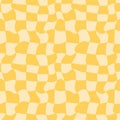 Groovy distorted positive chessboard seamless pattern. Trippy twisted grid background. Yellow monochrome textile fabric design. Royalty Free Stock Photo