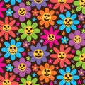 Retro 70s Groovy Scary Halloween flowers seamless pattern with stars in purple, blue, pink, green and red on dark background. Royalty Free Stock Photo