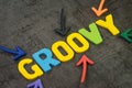 Groovy modern programming language for software development or application concept, multi color arrows pointing to the word Groovy Royalty Free Stock Photo