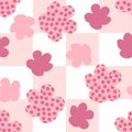 Groovy spotted flowers seamless pattern on checkered background. Retro floral print for fabric, paper, T-shirt. Summer vector Royalty Free Stock Photo
