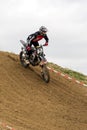 Gross Schwiesow, Germany - March 01,2019 - Motocross racer jump over a sand hill
