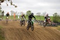 Gross Schwiesow, Germany - March 01,2019 - Motocross racers jump over a sand hill.