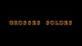 Grosses soldes fire text effect black background Royalty Free Stock Photo