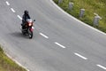 Grossglockner, Austria, 23 July 2015: Alpine road, motorbike speeding, Eastern Alps