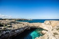 The Grotta della Poesia in the Puglia region of southern Italy with a clear view of the sea