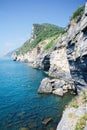 Grotta di lord Baron with turquoise water and coast with rock cliff, Portovenere town, Ligurian sea, park Cinque Terre, La Spezia