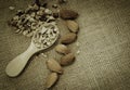 Ground almonds for sprinkling sweet food topping in wooden spoon Royalty Free Stock Photo