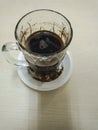 ground black coffee in a glass on the table Royalty Free Stock Photo