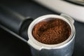 Ground black coffee in portafilter Royalty Free Stock Photo