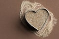 Ground Cardamom in a Heart Shape Royalty Free Stock Photo