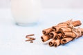 Ground cinnamon, sticks, tied with jute rope on old wooden background, selective focus, space for text, instagram filter Royalty Free Stock Photo