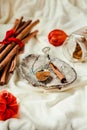 Ground cinnamon, cinnamon sticks, tied with red rope on old wood Royalty Free Stock Photo