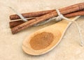 Ground cinnamon on wooden spoon Royalty Free Stock Photo