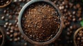 Ground coffee and coffee beans in bowl